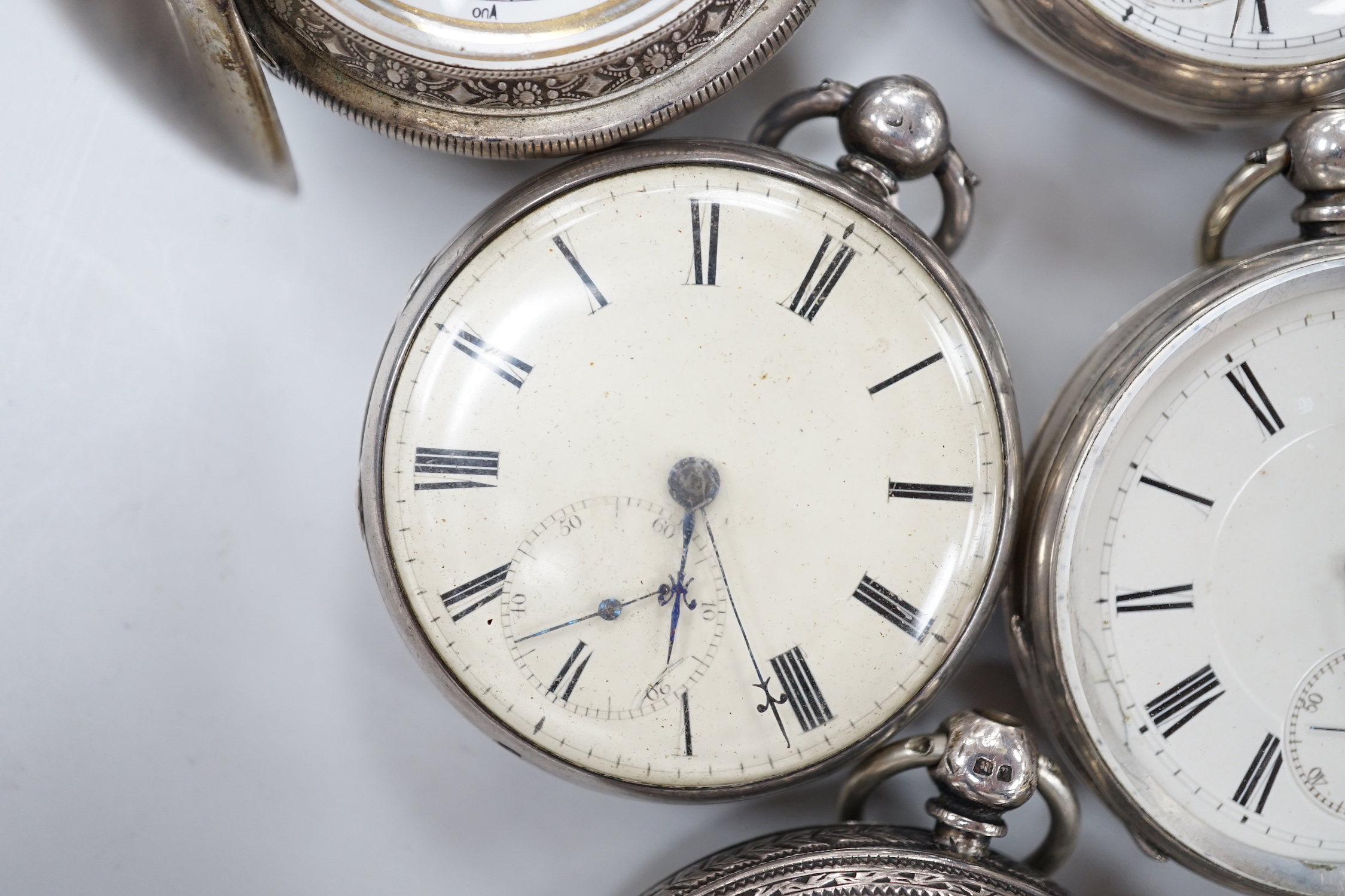 Nine assorted silver or white metal pocket watches including Joseph Stromier and John Forrest.